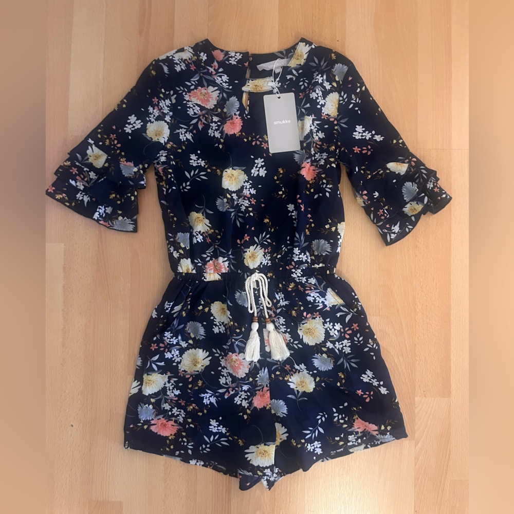 Floral Navy Romper with Tassel Detail